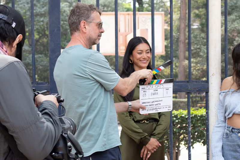Jenny Chiu smiles as she prepares for a scene on camera.